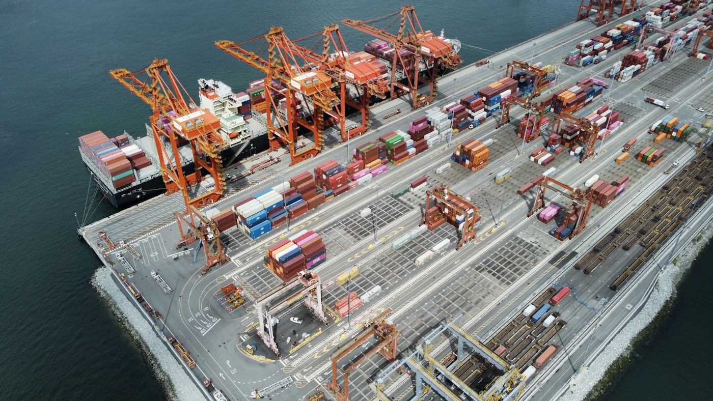Container cranes and cargo ships at an international port